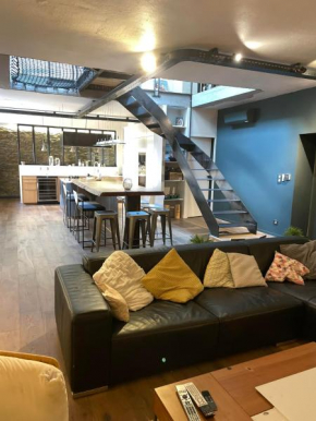 Appartement Loft centre ville situé dans rue calme